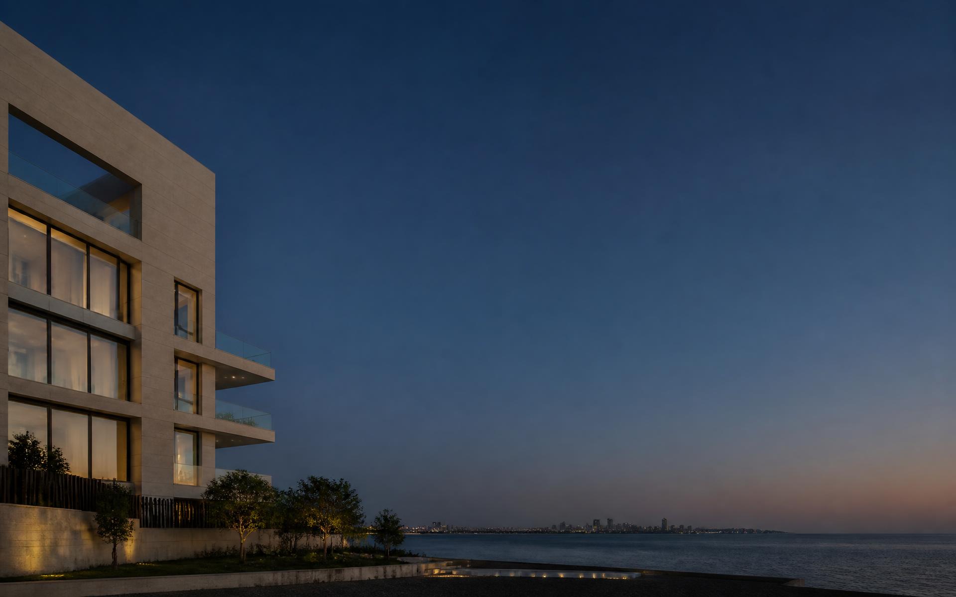 Contemporary coastal residence at dusk on the Abu Dhabi shoreline